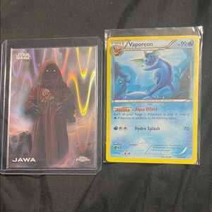 Star Wars Jawa Card and Vaporeon Pokémon Card